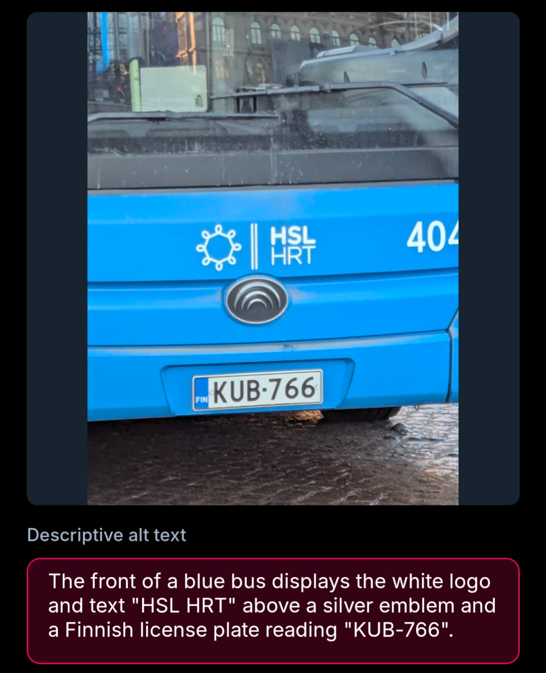 The front of a blue bus displays the white logo and text "HSL HRT" above a silver emblem and a Finnish license plate reading "KUB-766".